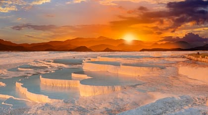 Beautiful sunrise at the Travertine pools and terraces in Turkey