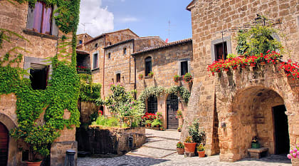 Wander the beautiful streets and ancient city walls as you visit the towns of the Lazio region. Wander the beautiful streets and ancient city walls as you visit the towns of the Lazio region.