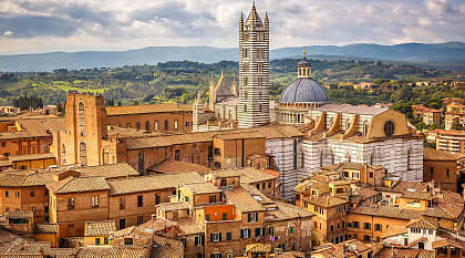 Walk the cobbled streets of historic Siena to explore the preserved walls, palaces and the untouched cathedral.