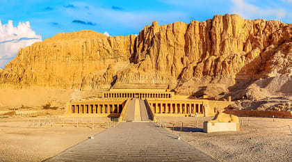 Famous History of Egypt Tour Temple of Queen Hatshepsut beneath the cliffs at Deir el-Bahari in Egypt.