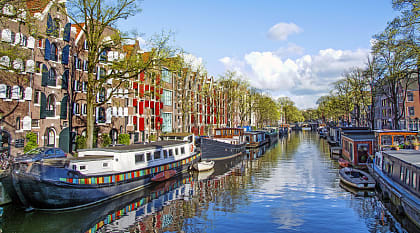 Dutch buildings and canal in Amsterdam, Netherlands