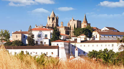 Washed buildings surrounding the Cathedral in Evora, Portugal