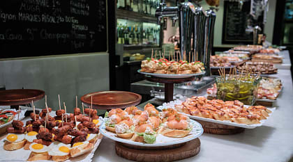 Spanish tapas, or pintxos, on the counter at a bar in San Sebastian, Spain Spanish tapas, or pintxos, on the counter at a bar in San Sebastian, Spain