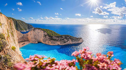 Navagio beach with shipwreck and flowers on Zakynthos island in Greece.