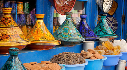 Colorful tagine plates in souk market, Morocco
