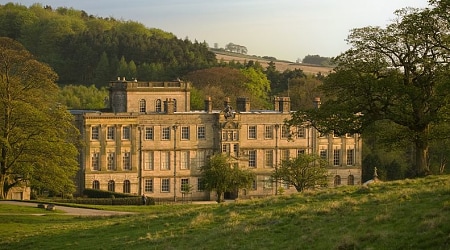 Lyme Park in Cheshire, England, was Pemberley's exterior in the 1995 BBC adaptation of Pride and Prejudice Elegant historic manor house in the English countryside, surrounded by lush greenery and rolling hills