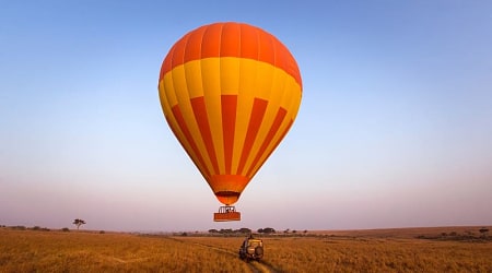 The Best of Kenya Tour - Masai Mara Hot air balloons drifting over the Masai Mara Savannah