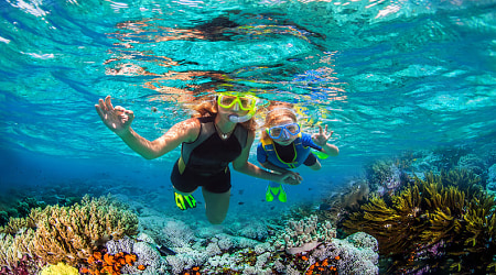 Perfect Family Vacation in Belize - Snorkeling Mother and daughter snorkeling