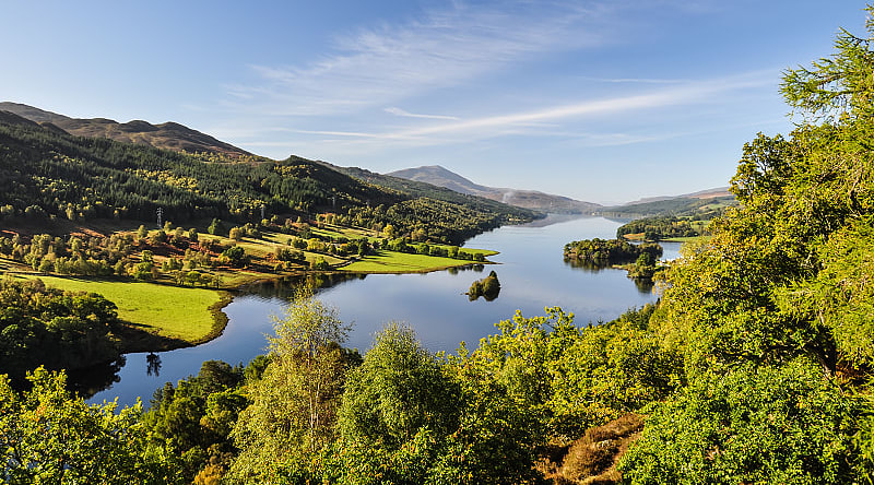 Beautiful summer view across Loch Tummel seen from Queen's View, located near Pitlochry, Perthshire, Scotland, UK. Beautiful summer view across Loch Tummel seen from Queen's View, located near Pitlochry, Perthshire, Scotland, UK.