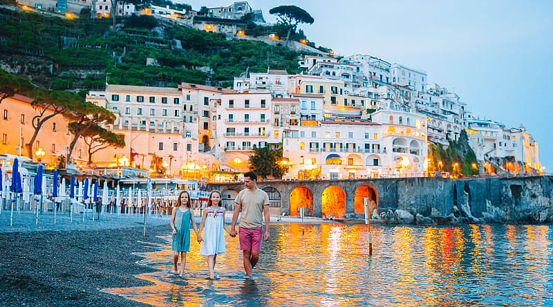 Amalfi Coast in Italy Father with his daughters on the Amalfi Coast in Italy