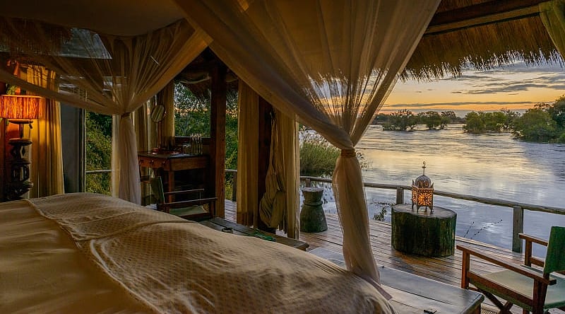 Photo courtesy of Sindabezi Island Camp Sunset view from chalet near Victoria Falls, Zambia. Photo courtesy of Sindabezi Island Camp