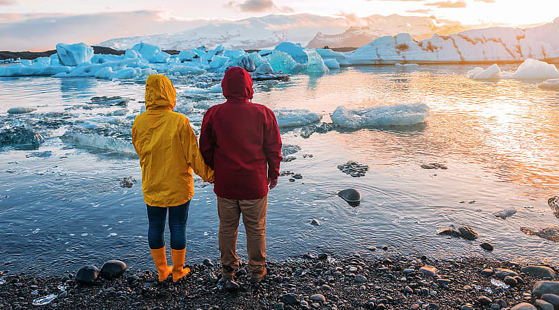 Jokulsarlon Glacier Lagoon in Iceland couple at Jokulsarlon Glacier Lagoon in Iceland