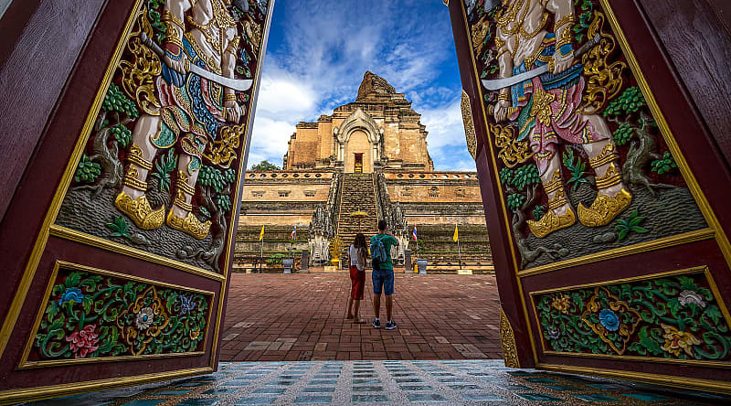 Couple at Wat Chedi Luang, Chiang Mai, Thailand Couple at Wat Chedi Luang, Chiang Mai, Thailand
