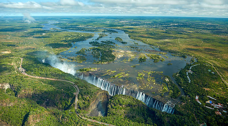 Victoria Falls between Zambia and Zimbabwe Victoria Falls and the Zambezi river between Zambia and Zimbabwe