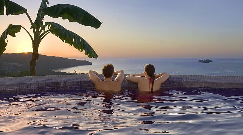 Couple enjoying the sunset in Costa Rica Couple enjoying the sunset in Costa Rica