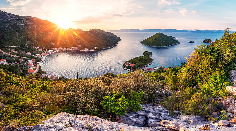 Sunset behind Prozurska Luka on the island Mljet in Croatia Sunset behind Prozurska Luka on the island Mljet in Croatia