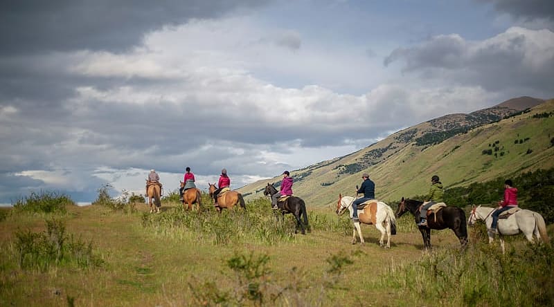 El Calafate, Argentina. Photo courtesy of Visit Argentina Family horseback riding in El Calafate, Argentina