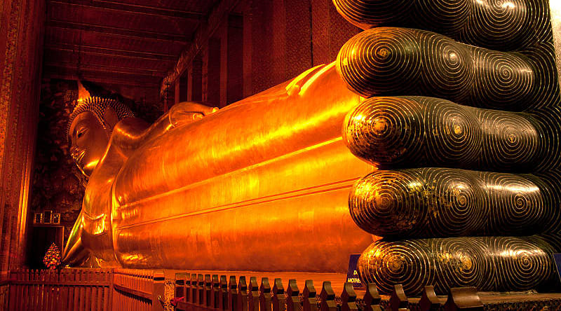 Golden reclining Buddha in Bangkok, Thailand. Golden reclining Buddha in Bangkok, Thailand.