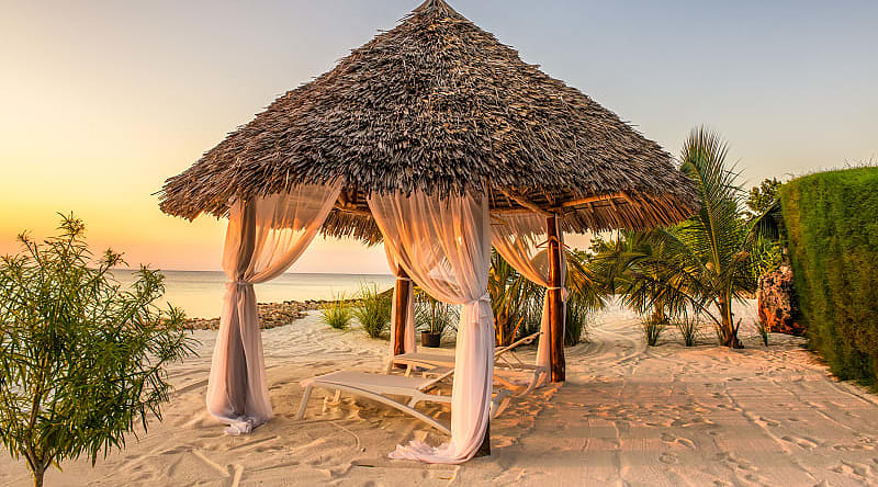 A Zanzibar beach at sunset. A Zanzibar beach at sunset.