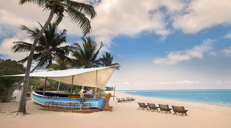 Photo © DookPhoto, courtesy of andBeyond The Dhow Bar on the beach at andBeyond Benguerra Island.