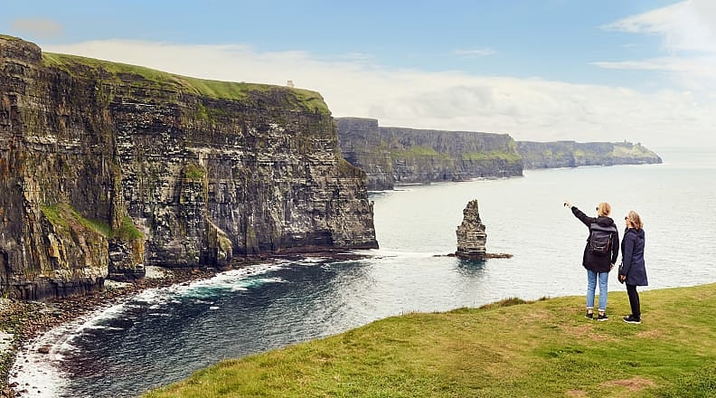 Mother and daughter at the Cliffs of Moher in Ireland