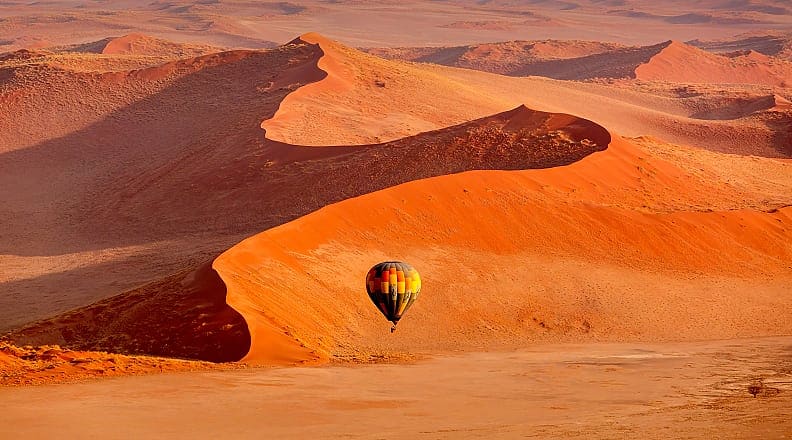 Hot air balloon over Sossusvlei, Namibia Hot air balloon over Sossusvlei, Namibia