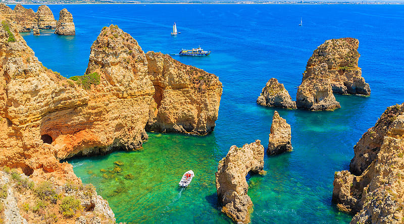 Boats on the water at Ponta da Piedade in Portugal. Boats on the water at Ponta da Piedade in Portugal.