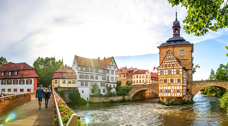 Bamberg, Germany Couple walking across a bridge in Bamberg, Germany.
