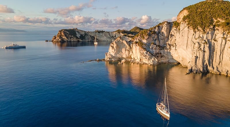 Ponza, Italy Sailboats at sunset around the beautiful island of Ponza in Italy
