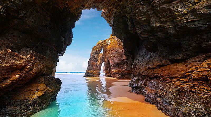 Caves on the beach in Galicia, Spain Caves on the beach in Galicia, Spain