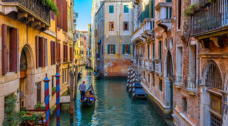 Take an unforgettable gondola ride through Venice at sunset Take an unforgettable gondola ride through Venice at sunset