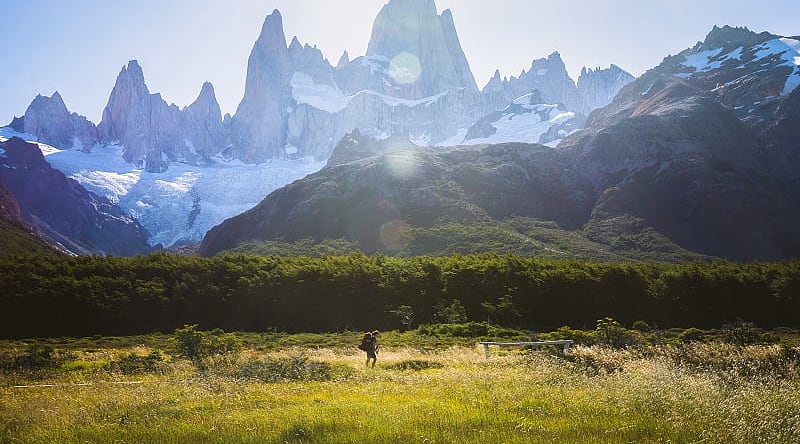 Patagonia, Argentina Woman hiking under Fitz Roy in Los Glaciares National Park in Patagonia, Argentina
