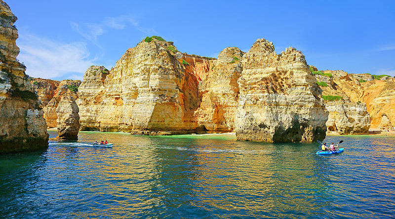 Kayaking around the caves at Ponte de Piedade in Algarve, Portugal.