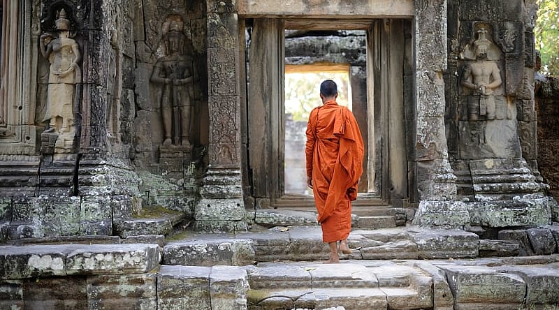 Monk at Angkor Kdei Temple in Cambodia Monk at Angkor Kdei Temple in Cambodia