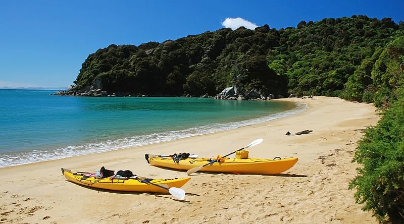 Abel Tasman National Park, New Zealand Kayaks on the beach in Abel Tasman National Park