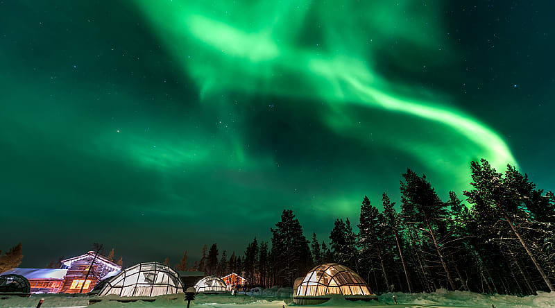 Aurora Borealis above igloos in Finland Aurora Borealis above igloos in Finland