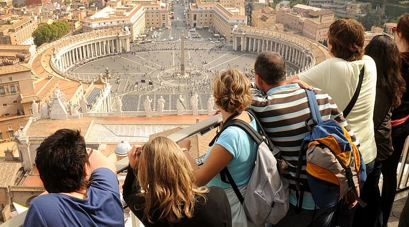 Traveling family admiring the Vatican in Rome, Italy Traveling family admiring the Vatican in Rome, Italy