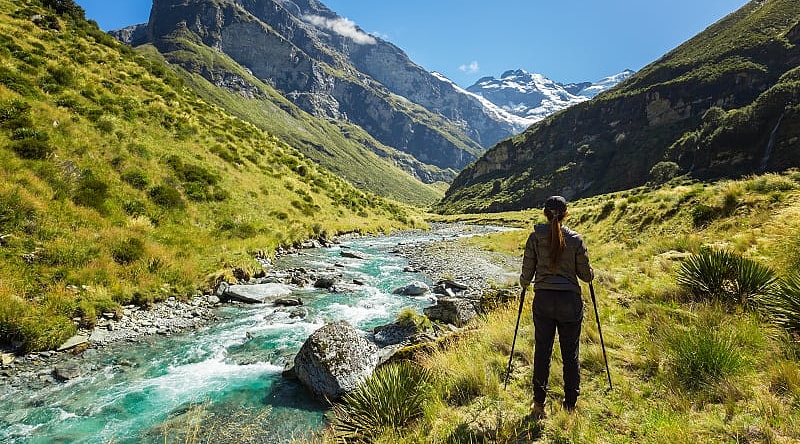 New Zealand mountain river hiker New Zealand mountain river hiker