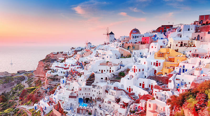 Village of Oia on Santorini, Greece Village of Oia at sunset in Greece