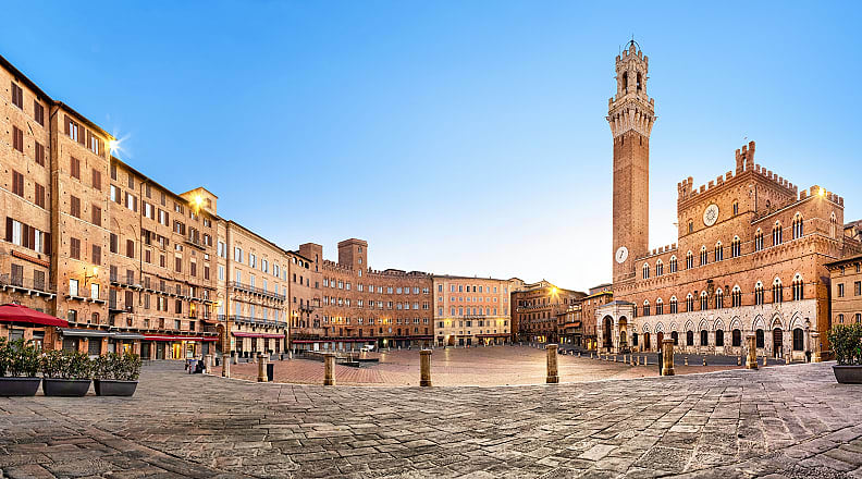 Piazza del Campo in Siena, Italy Piazza del Campo with gothic town hall building and tower in Siena, Italy