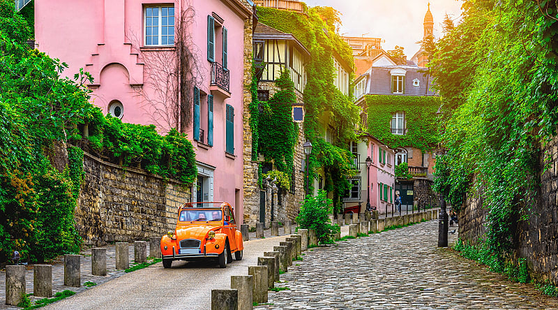 View of an old street in the Montmartre quarter in Paris View of an old street in the Montmartre quarter in Paris