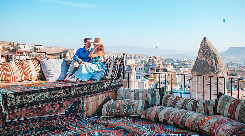Couple in Cappadocia at sunrise in Turkey. Couple in Cappadocia at sunrise in Turkey.