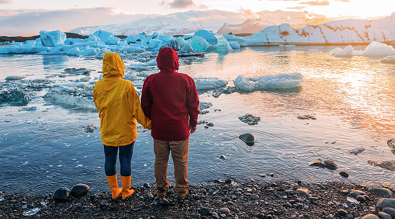 Jokulsarlon Glacier Lagoon in Iceland couple at Jokulsarlon Glacier Lagoon in Iceland