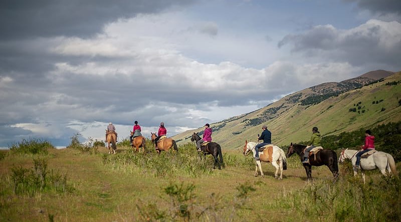 El Calafate, Argentina. Photo courtesy of Visit Argentina Family horseback riding in El Calafate, Argentina