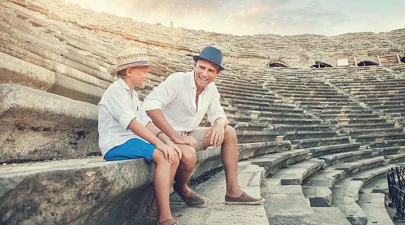 Hierapolis Ruins in Pamukkale, Turkey Father and son at Hierapolis ruins in Pamukkale, Turkey