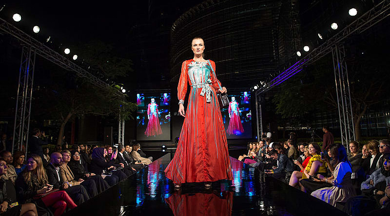 A runway model in Paris Credit: Ahmad Ardity