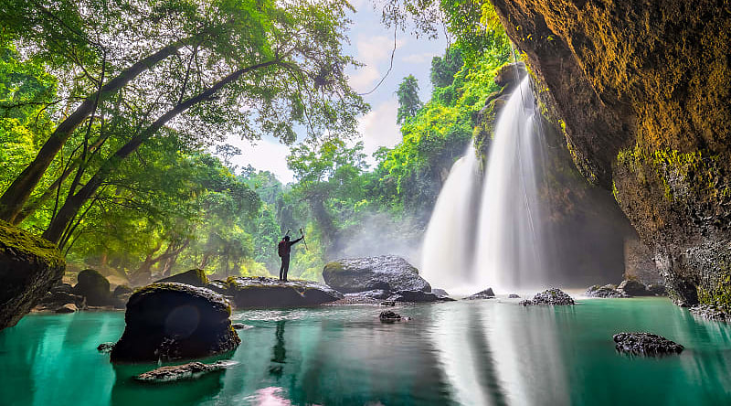 Khao Yai National Park, Thailand Hiker at Haew Suwat waterfall in Khao Yai National Park, Thailand