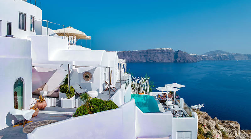Athens & Greek Islands Honeymoon Honeymooners in Oia on Santorini Island, Greece