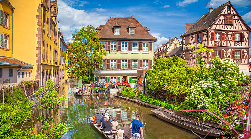 Colorful traditional houses on idyllic river in Colmar, Alsace Region, France Colorful traditional houses on idyllic river in Colmar, Alsace Region, France