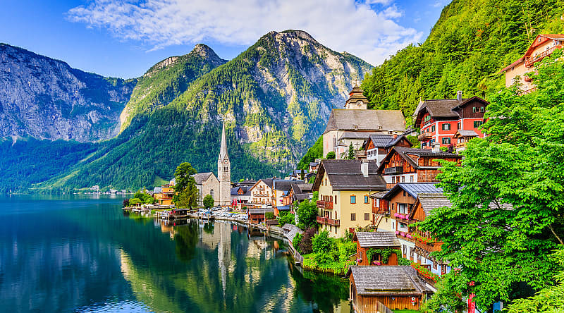 Mountain village at sunrise in Hallstatt, Austria. Mountain village at sunrise in Hallstatt, Austria.